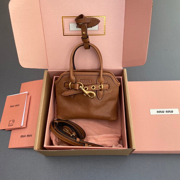 AVENTURE BAG 13 IN SANTA FE BROWN SHINY CALFSKIN